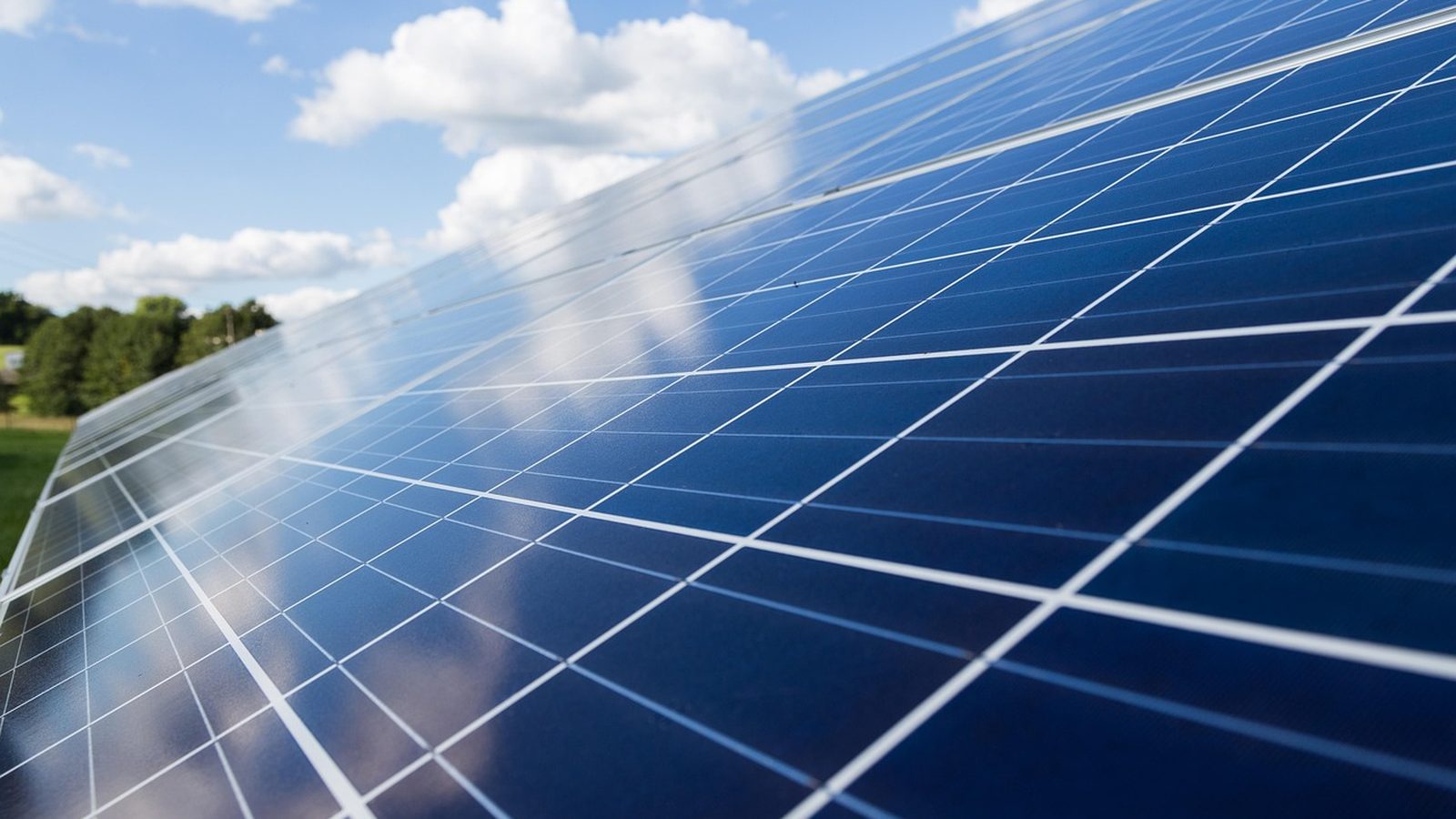 Photovoltaic array under a partly cloudy sky