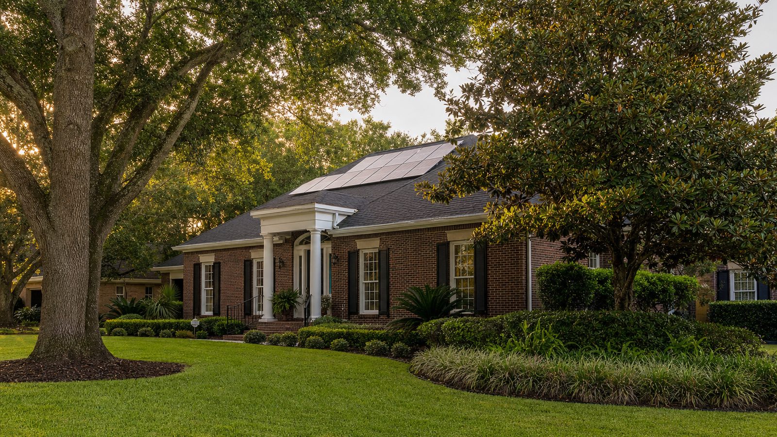 Georgia home with rooftop solar panels in a leafy neighborhood