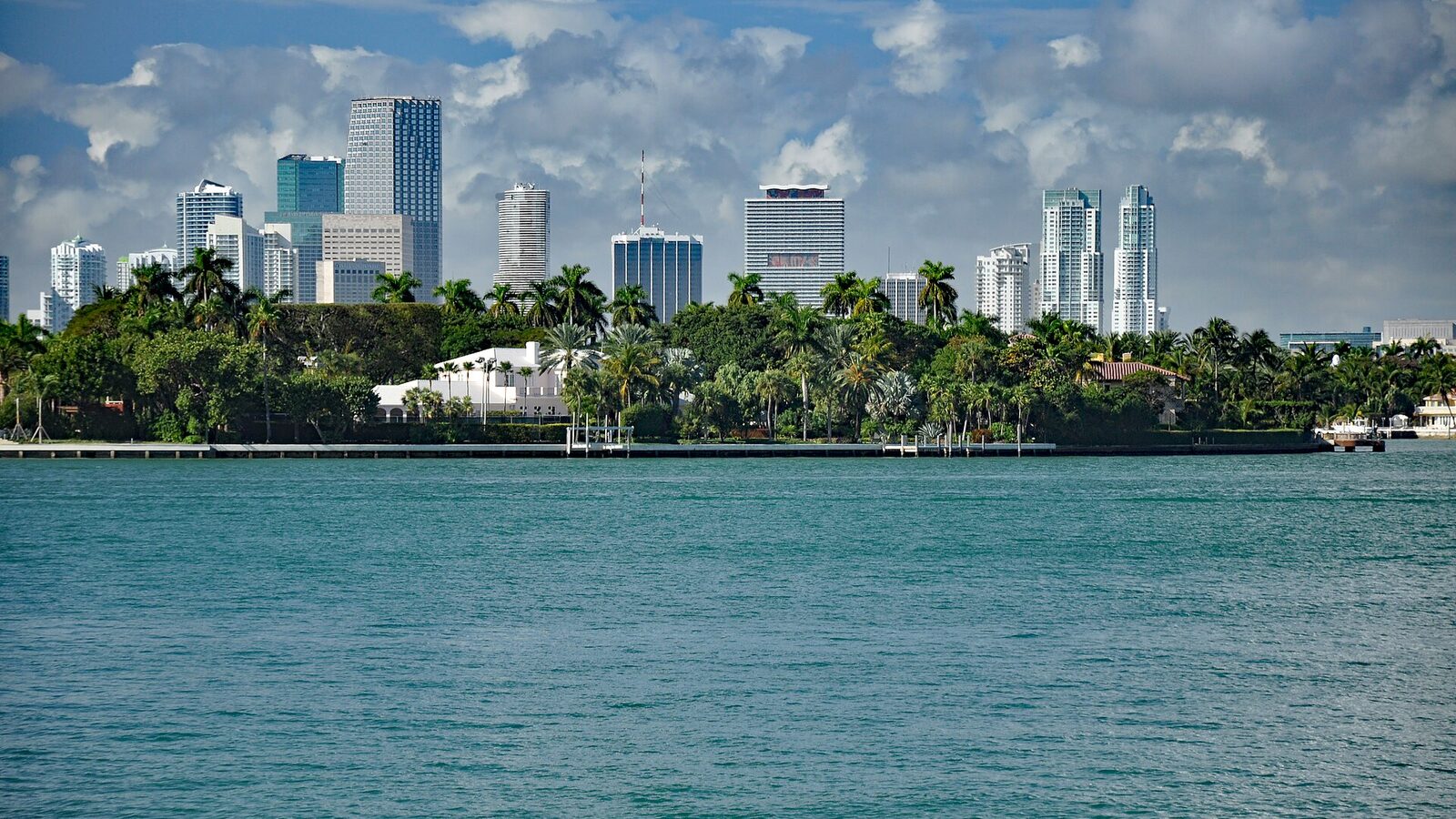 Miami skyline seen from Biscayne Bay under a clear sky
